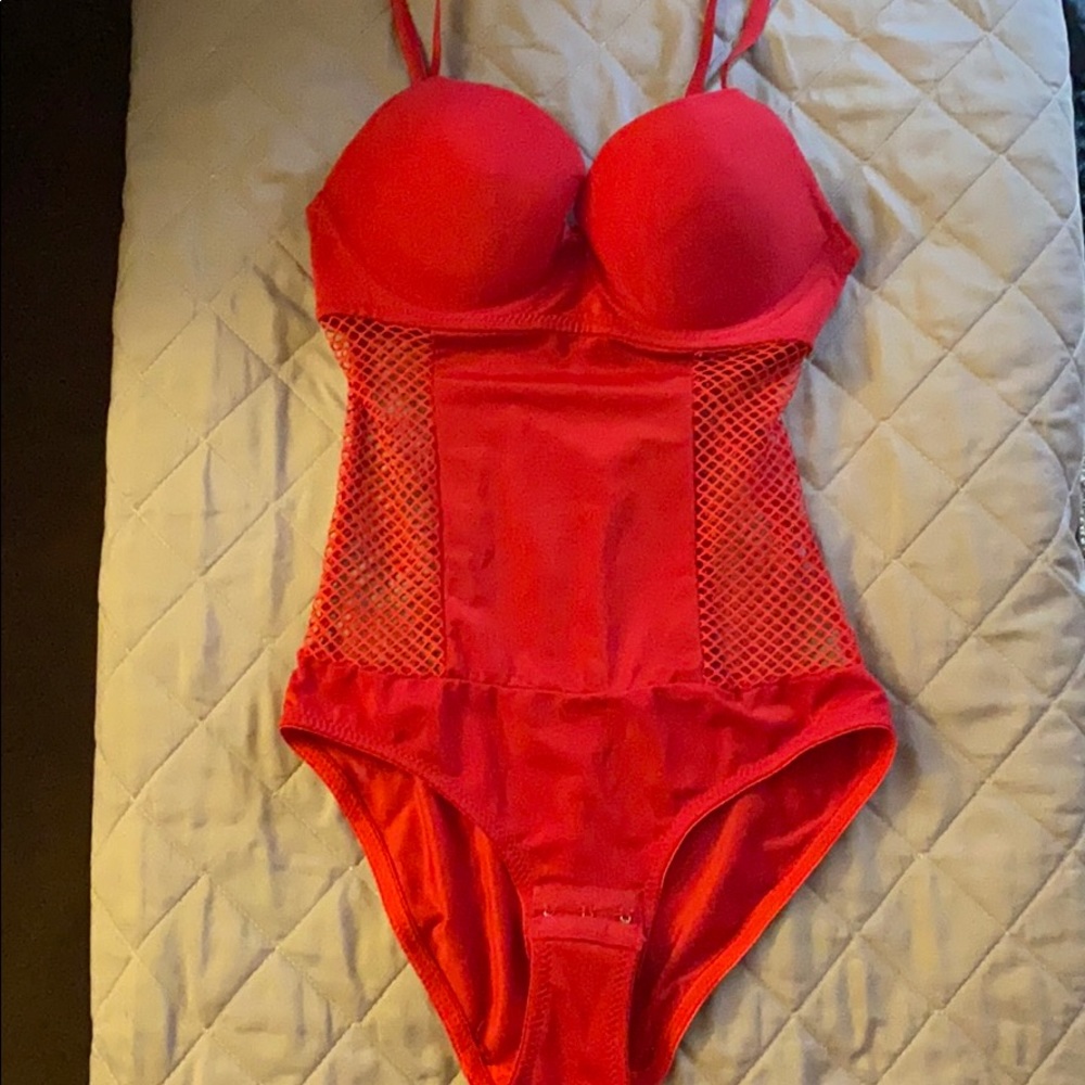 red fishnet bodysuit